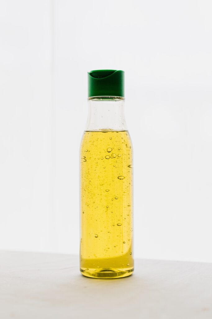 Bottle of oil, type 4 hair